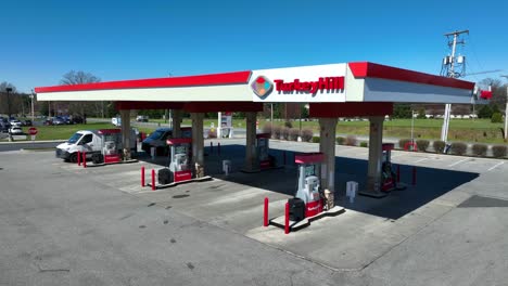 Aerial-approaching-shot-of-Turkey-Hill-Service-Station-in-American-Suburb-Town