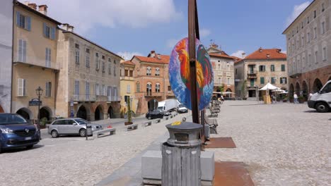 Mondovì-central-square-with-colourful-cockerel-Artwork
