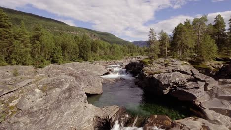Aerial-of-a-small-river-with-rapids-and-pools-in-northern-Norway