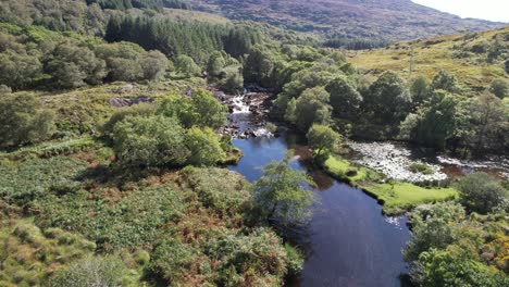 Drone-video-showing-flyover-of-a-stream-and-lake-in-the-Black-Valley-in-Kerry-Ireland