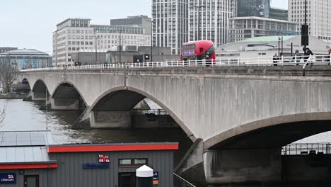 Get-yourself-a-bus-over-Waterloo-Bridge,-London,-United-Kingdom