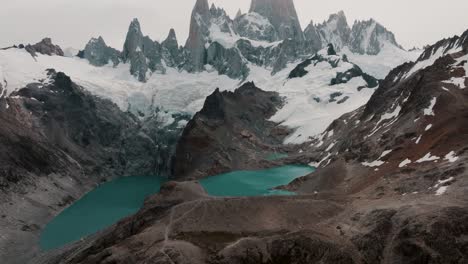 Fitz-Roy-Mountain-With-Lake-In-Patagonia,-Argentina---Tilt-Up