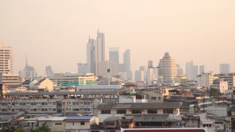 colorful-sunset-panoramic-view-of-Bangkok-skyline-from-elevated-view-in-the-Rattanakosin-old-town-of-Bangkok,-Thailand