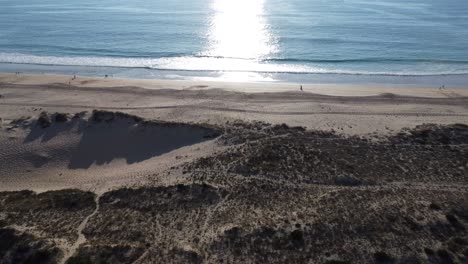 Sunset,-Dunes-and-Ocean-at-Praia-do-Medao-beach,-Peniche,-Portugal