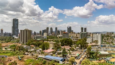Addis-Ababa,-Ethiopia,-time-lapse-dolly-in,-fast-moving-clouds,-high-angle-view-of-the-city-center