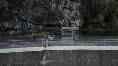 Aerial-shot-of-a-little-dam-in-Walensee,-Switzerland
