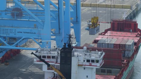 Loading-Cargo-Ship-By-Gantry-At-APM-Terminal-In-Maasvlakte-Rotterdam,-Netherlands