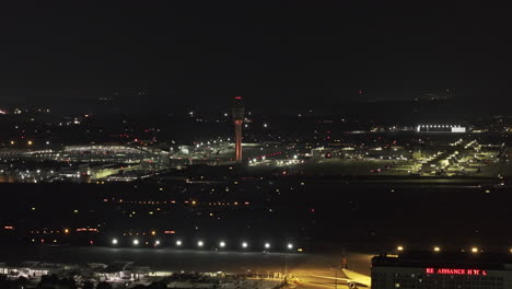 Atlanta-Georgia-Aerial-v953-flyover-Hapeville-capturing-night-activities-at-ATL-Hartsfield-Jackson-International-Airport-and-airplane-taxiing-on-the-runway---Shot-with-Mavic-3-Pro-Cine---June-2023