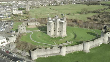 Aerial-View-Of-Trim-Castle-By-The-River-Boyne-in-Trim,-County-Meath,-Ireland