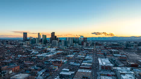 Sunset-drone-hyperlapse-over-River-North-Art-District-and-view-of-Denver-skyline