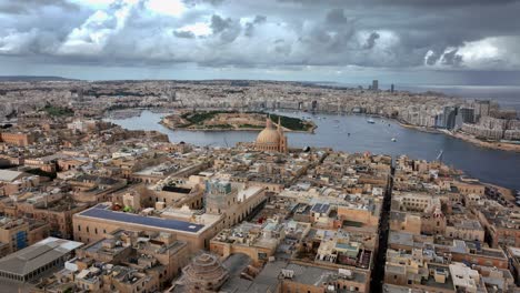 Aerial-view-of-Valletta-city,-Manoel-island-and-Sliema-on-a-cloudy-day