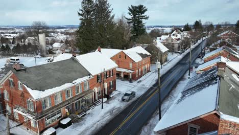 Aerial-establishing-shot-of-a-small-town-American-road