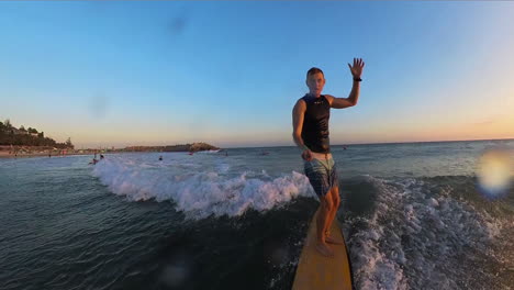 Surfer-Catching-A-Long-Wave-In-Mui-Ne,-Vietnam