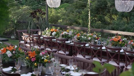 Wedding-banquet-table-with-colorful-floral-centerpieces