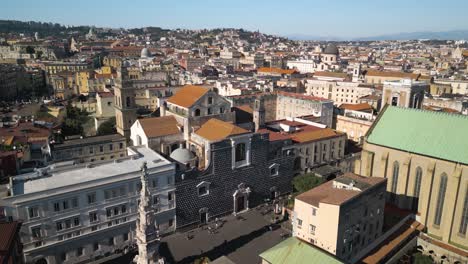 Cinematic-Aerial-View-Above-Piazza-del-Gesù,-Church-of-Gesu-Nuovo---Naples,-Italy