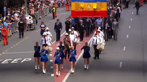 Representatives-from-the-Royal-Australian-Electrical-and-Mechanical-Engineers-RAEME-marching-down-the-street-of-Brisbane-city,-amidst-the-solemnity-of-the-Anzac-Day-commemoration