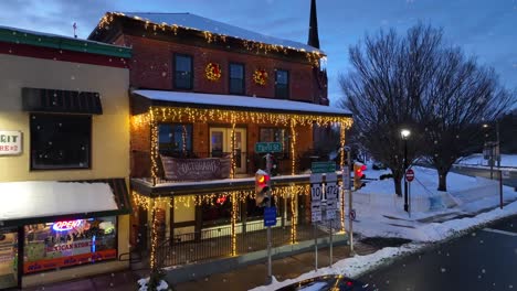 Decorated-restaurant-building-with-chain-of-lights-in-winter
