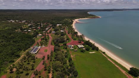 Overhead-moving-aerial-clip-of-remote-community-coastline-in-northern-Australia