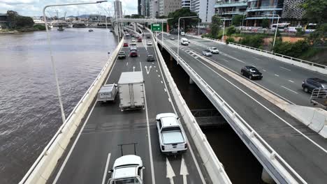 Traffic-flowing-freely-on-a-multi-lane-freeway-near-a-river-in-Australia
