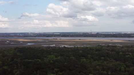 Wide-aerial-shot-flying-over-the-Old-Charles-Towne-Landing-Site-along-the-Ashley-River-in-South-Carolina