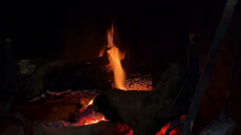 Warm-fireplace-with-fire-burning-in-background,-Close-up