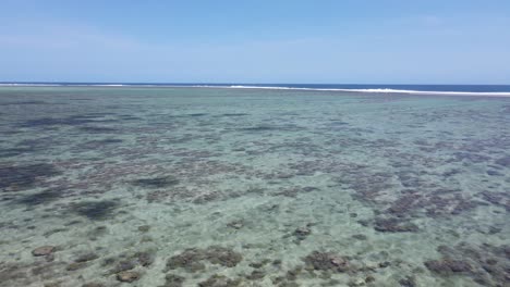 Aerial-tour-over-the-crystal-clear-waters-of-the-coral-coast-in-Fiji