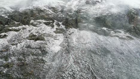 4k-Aerial-Drone-Footage-of-Mist-and-Clouds-over-Snowy-Rocky-Mountains-near-Breckenridge-Colorado-in-Winter