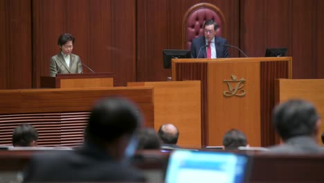 Carrie-Lam-,-former-Hong-Kong's-chief-executive,-and-Andrew-Leung,-Hong-Kong-Legislative-Council-President,-as-she-delivers-the-annual-policy-address-at-the-Legislative-Council-building