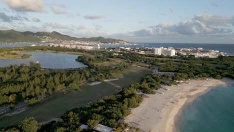 Mullet-Bay-Saint-Martin-Aerial-Drone-fly-over-beach-and-golf-course-toward-Maho-and-Airport