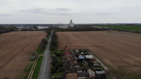 Rising-drone-shot-showing-fields-and-Little-Barford-power-station-in-the-background