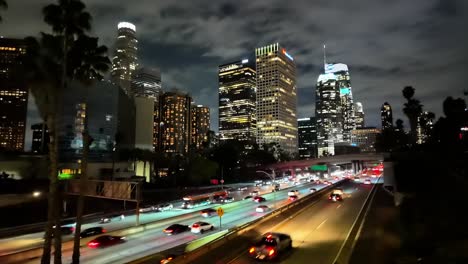 Time-lapse-of-downtown-Los-Angeles-on-a-dark-cloudy-night-with-glow-from-office-buildings