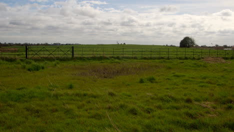 Extra-Wide-shot-from-St-Benet’s-abbey-16th-century-gatehouse-with-18th-century-windmill