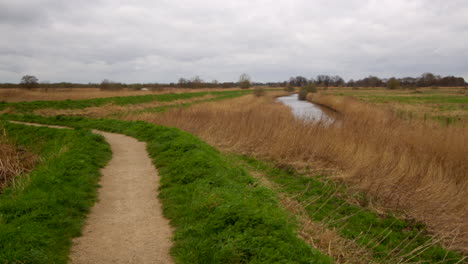 wide-landscape-shot-of-drainage-ditch-next-to-the-river-Bure