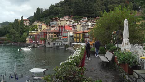 People-Takes-Selfies-near-Beautiful-Villas-of-Varenna-Town-near-Lake-Como-in-the-Early-Autumn-Morning