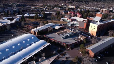 Drone-Shot-or-Northern-Arizona-University-Campus-Buildings,-Flagstaff-USA-on-Sunny-Winter-Day