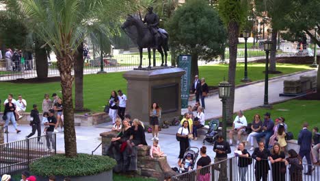 Excitement-fills-the-air-as-crowds-gather-in-downtown-Brisbane-city,-swelling-with-anticipation-before-the-commencement-of-the-annual-tradition-Anzac-Day-parade-at-Anzac-Square