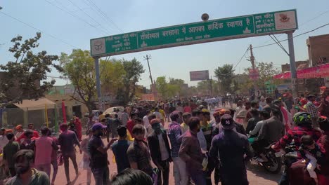 People-are-enjoying-Holi-Dhuleti-in-the-middle-of-the-market-Many-people-are-going-to-have-darshan-in-the-temple-and-many-people-are-welcoming-the-people-who-are-coming-to-have-this-darshan