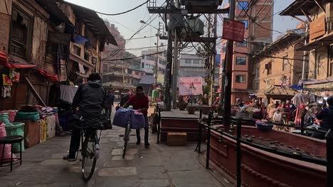 Walking-through-the-busy-streets-in-central-Kathmandu,-Thamel