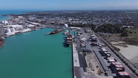 Birds-eye-view-flying-out-of-Timaru-Harbor-in-New-Zealand