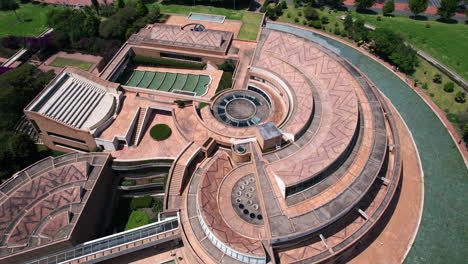 Modern-Architecture-of-Bogota,-Colombia,-Aerial-View-of-Virgilio-Barco-Library-Building-in-Simon-Bolivar-Park,-Drone-Shot