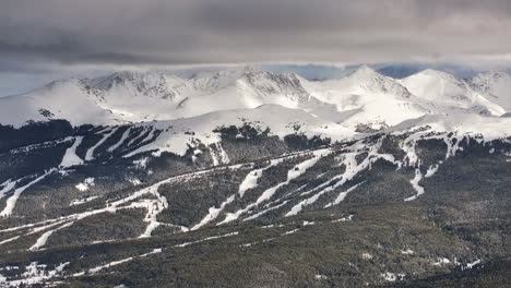 Vail-pass-i70-perspective-of-Copper-Mountain-ski-resort-trail-runs-Breck-ten-mile-range-Leadville-Colorado-epic-ikon-Rocky-snowy-winter-spring-snow-field-peaks-late-afternoon-clouds-upward-motion