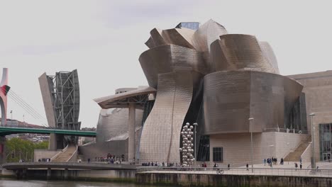 Bilbao,-Spain,-Exterior-of-Guggenheim-Art-Museum-Building-Along-Nervion-Estuary