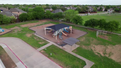 Aerial-video-of-playground-at-Prairie-Trail-Elementary-school-in-Flower-Mound,-Texas