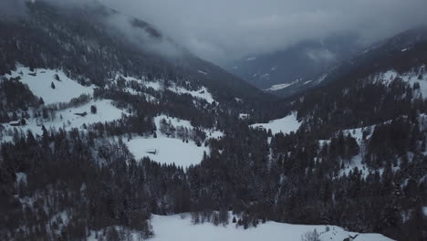 Aerial-drone-shot-of-snowy-mountain-landscape