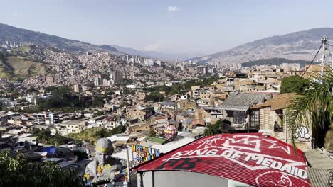 Panoramic-picturesque-town-skyline-at-medellin-colombia-comuna-13-establishing-location-spot-in-mountain-valley-stores