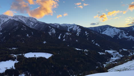 Val-di-Funes-town-Dolomites-Italia-Italy-sharp-stunning-mountain-rocky-jagged-Italian-Alps-Lavaredo-peaks-valley-Tirol-Tyrol-Bolzano-heavenly-sunset-October-November-autumn-scenic-landscape-pan-left