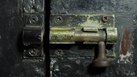 Old-Bolt-Lock-On-A-Vintage-Wooden-Door