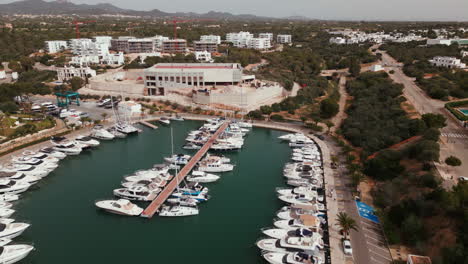 Scenic-aerial-view-of-Cala-d'Or-Marina-in-Mallorca-with-yachts