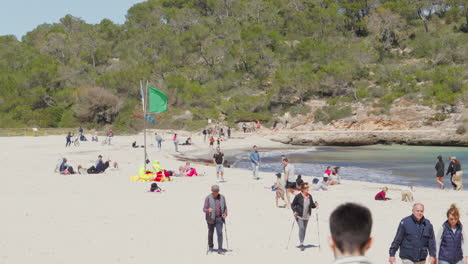 Sunny-beach-day-at-Cala-Mondrago,-Mallorca-with-tourists