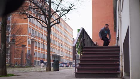 Skater-does-a-trick-on-a-handrail